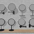 Round Mirrors with Metal Stands Wall Mounted and Tabletop on Gray Wall and Wooden Shelf
