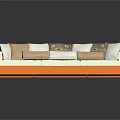 Stylish L Shaped Sofa In White And Orange With Multiple Decorative Cushions