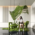 Indoor Landscape With Green Plant Art Installations And Sculptural Shapes In Modern Interior