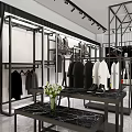 Modern Clothing Store Interior With Hangers Clothes Chairs Tables And Flowers