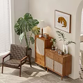 Wooden Decorative Cabinet In Living Room With Chair Plant Table Lamp And Framed Art