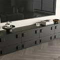 Modern Black TV Stand With Drawers Tray Books And Decorative Bowl In Living Room