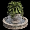 Garden Ornament Fountain With Decorative Stone Base Green Plants And Flowing Water