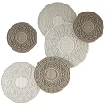 Multiple Round Textured Wall Decorations With Geometric Patterns In Neutral Tones 3d model