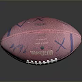 Pink Wilson Rugby Ball With White Stitching Dark Blue Accents And Textured Surface