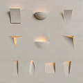 Unique Shaped Wall Lamps with Soft Warm Glow Mounted on Light Gray Wall