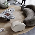 Modern Living Room With Gray Curved Sofa And Marble Coffee Table Combination