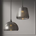 Two Modern Glass Pendant Lights With Diamond Textured Shades Hanging On Gray Wall