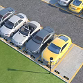 Various Colored Cars Neatly Parked in Outdoor Parking Lot With Green Grass And Yellow Lines