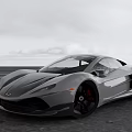 Silver Sports Car Parked On Open Road With Sky And Distant Horizon