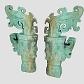 Ancient Bronze Dragon Shaped Sculptures With Intricate Patterns And Symmetrical Design