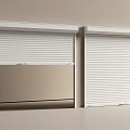 White Roller Shutters Installed On Light Colored Wall With Simple Design