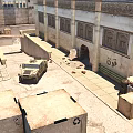 Middle Eastern Street Scene With Traditional Architecture Military Vehicle Palm Tree And Stone Pavement
