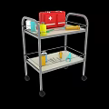 Medical Cart With Red First Aid Kit Medicine Bottles And Syringe On Shelves
