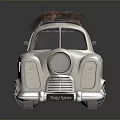 White Toy Car With Red And White Bow On Roof And Red Star On Front