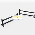 Two Black Metal Railings With Decorative Ends And Sturdy Brackets