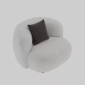 Cozy Beige Plush Armchair With Checkered Pillow And Wooden Legs