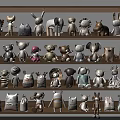 Adorable Stuffed Animal Dolls on Multiple Shelves with Different Colors and Designs