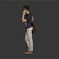 Man Talking on Phone in Dark T-Shirt and Light Pants Carrying Backpack Against Gray Background