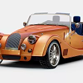 Orange Vintage Convertible Car With Classic Grille Large Wheels And Retro Design