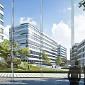 Modern Office Complex With Glass Buildings And Green Landscape
