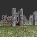 Ancient Urban Architectural Complex Ruins With Tall Towers Remaining Walls And Green Grassland