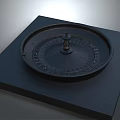 Modern Accent Furniture Piece With Black Circular Top Dark Square Base And Compass Details