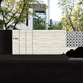 Modern Building Exterior With Stone Wall Glass Windows And Green Trees Around Driveway