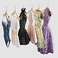 Stylish Dresses In Multiple Colors With Straps Floral Prints And Ruffles Hanging On Wooden Hangers