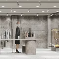 Modern Clothing Store Interior With Mannequins Hangers And Display Tables
