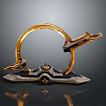 Golden Circular Ring Sculpture With Intricate Metallic Base And Decorative Elements