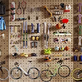 Organized Sports Fitness Equipment Wall Storage with Bikes Rackets and Ski Gear