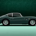 Green Vintage Sports Car With Sleek Body Design And Classic Retro Styling
