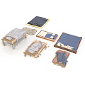 Various Furniture Pieces With Wooden Frames And Blue Gray Fabric Mattresses