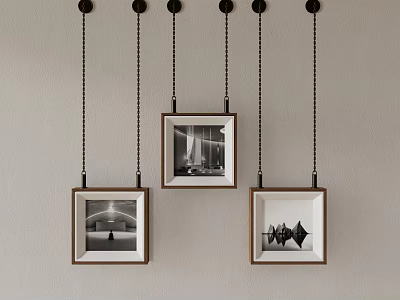 Wooden Frames With Black And White Photos Hanging On Gray Wall With Chains 3d model
