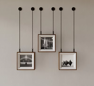 Wooden Frames With Black And White Photos Hanging On Gray Wall With Chains 3d model