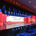 YSMD Woodworking Studio Cultural Evening With Bright Stage Lighting And Audience Seats