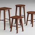 Set of Four Modern Wooden Bar Stools with Simple Design Various Heights and Sturdy Construction