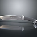 Sharp Metal Blade Knife With Black Handle And Silver Accents On Reflective Surface