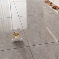 Gray Floor Tiles With Smooth Glossy Surface And Decorative Item Near Shoe Cabinet