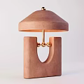 Pink Table Lamp With Column Base U Shaped Cutout Domed Shade And Gold Decorative Balls