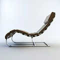 Brown Leather Lounge Chair With Sleek Metal Frame And Modern Design