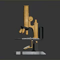 Vintage Golden Microscope With Silver Base On Dark Reflective Surface
