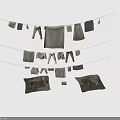 Light Gray Apparel Hanging on Ropes Including Pants Towels and Tops
