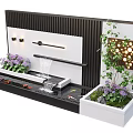 Modern Water Feature Fountain With Flowing Water Small Fish Pond Purple Flowers And Green Plants