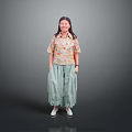 A Woman Wearing Floral Shirt And Green Skirt Standing On Gray Background