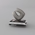 Minimalist Modern Sleek Metallic Decorative Ornament Set On Stacked Books