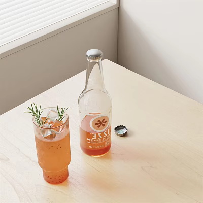 Bottle and Glass with Orange Drink Rosemary Lemon Slice on Light Wooden Table by Window 3d model