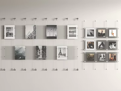 Wall With Multiple Photo Frames Arranged Neatly Featuring Black White Photos Home Decor 3d model