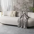 Gray Sectional Sofa with Beige Throw Pillow Knitted Blanket and Curtains in Living Room